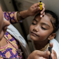 Child-getting-makeup